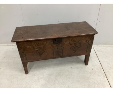 A small 17th century carved oak six plank coffer, width 96cm, depth 37cm, height 54cm. Condition - fair