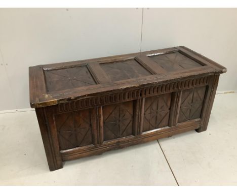 An early 18th century and later oak coffer, width 132cm, height 58cm. Condition - poor