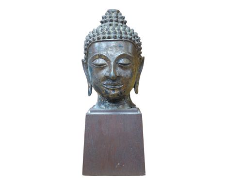 A Thai bronze head of Buddha, probably 18th century, 25cm high. Condition - good