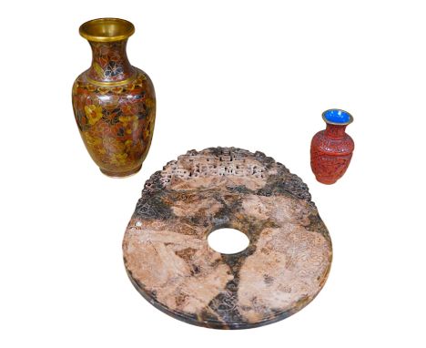 A Chinese archaistic hardstone large bi disc, a cinnabar lacquer vase and a cloisonné enamel vase, largest 32cm high (3). Con