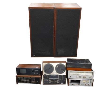 A pair of floorstanding IMF speakers, together with a Sony three-head reel to reel tape recorder, a National Panasonic compac