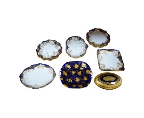 A collection of porcelain to include a Royal Doulton part dessert set, a Limoges gilt oval box and cover and a similar Davenp