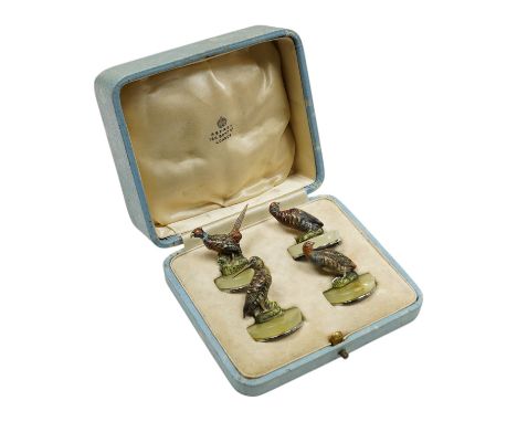 A cased Asprey set of four cold painted bronze and chrome plated novelty game bird menu holders, tallest 5cm high. Condition 