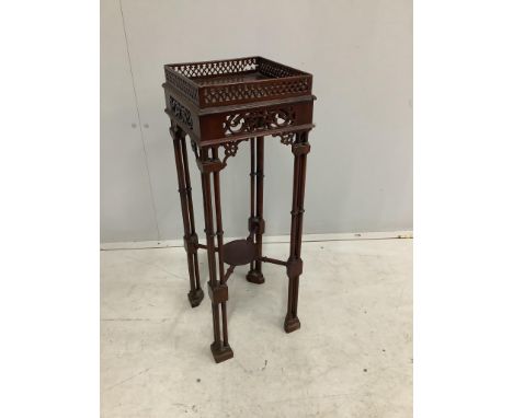 A Chippendale revival mahogany occasional table, width 25cm, height 72cm. Condition - poor to fair, damage to blind fret