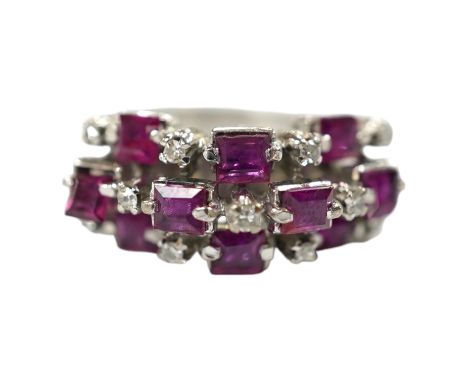 An 18k white metal, ruby and diamond cluster set cocktail ring, size K/L, gross weight 5.7 grams. Condition - fair to good