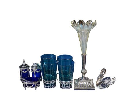 Four coloured glasses with silver stands a similar glass swan salt, a three piece cruet with white metal mounts and a plated 