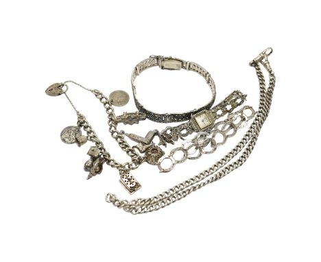 Two silver bracelets, a silver watch chain, a silver and marcasite bracelet and a similar watch. Condition - fair