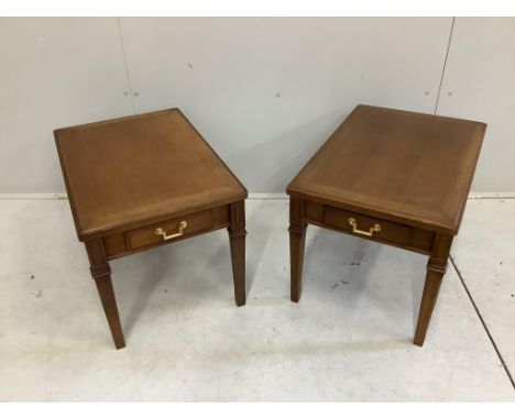 A pair of Maruni Furniture mahogany lamp tables, width 45cm, depth 68cm, height 45cm. Condition - fair
