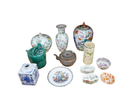 A collection of Chinese ceramics to include and bowls, plates, pottery dragon teapot and a green glaze water carrier, largest