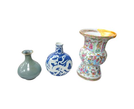A large 19th century Chinese famille rose vase, a green glazed pear-shaped vase, and a blue and white dragon flask (3). Condi