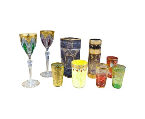 Nine Bohemian decorated glass items including a gilt rimmed and decorated glass inscribed ‘Moser 1503 D553/a’, four smaller g