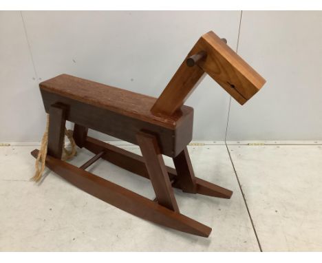 80-120A mid century design exotic hardwood rocking horse, length 114cm, height 88cm. Condition - good