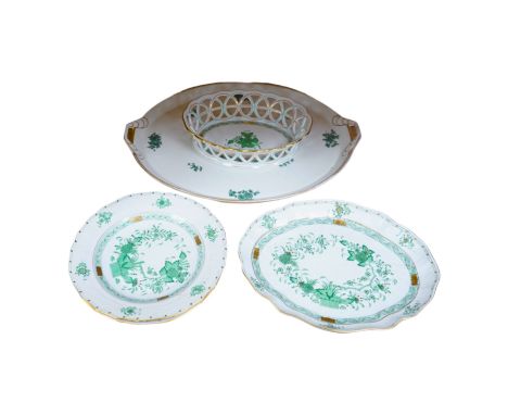 A Herend green decorated tray, 26cm wide, a similar pair of dishes and a basket, together with another larger porcelain tray,