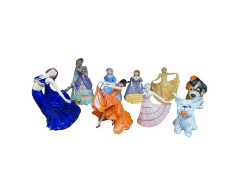 A Wade 1930s dancer ‘Jeanette’, 16cm high, together with six Crown Devon figures and two Crown Devon dogs, (9). Condition - f