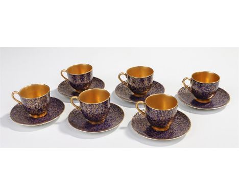 Royal Worcester coffee service, in cobalt blue and foliate gilt decoration, numbered to the underside 9195, consisting of six