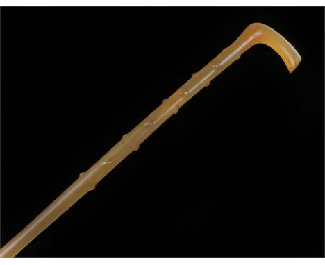 19th Century horn child's walking stick, possibly Rhinoceros, of small proportions, in the form of a thorny stick, 61cm high