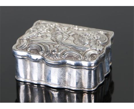 18th Century Dutch silver snuff box, maker FD under a crown, decorated with a seated figure holding a cross with blooms of fl