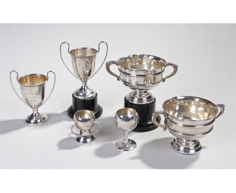 Silver trophies, various dates and makers, inscriptions for Mixed Foursomes, to include two pairs of trophies, a trophy with 