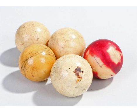 Victorian ivory billiard or snooker balls, four natural and one in red, (5)