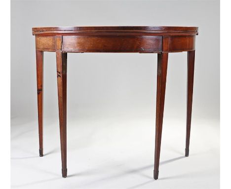 George III mahogany games table, the bow hinged top with satinwood banding above square section tapering legs on spade feet, 