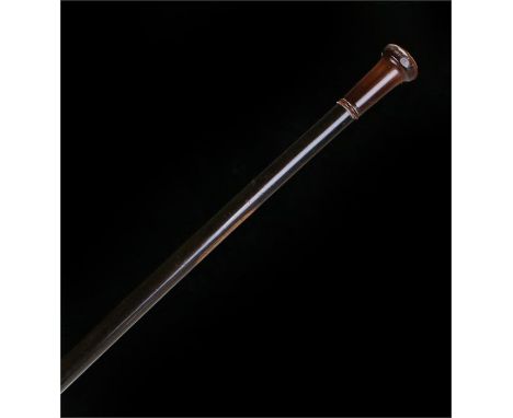 Victorian Rhinoceros horn handle stick, the turned horn top above a slender ebony shaft, length 89cm