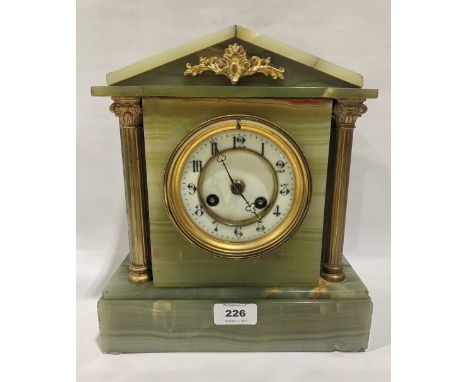 A French onyx architectural case mantle clock 11' high together with an onyx clock case
