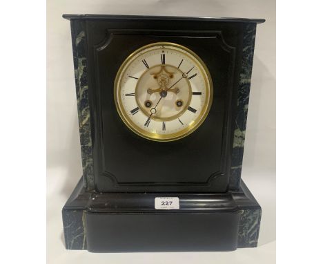 A French slate and marble mantle clock, with brass drum movement striking on a bell, the dial with Brocot escapement. 14' hig