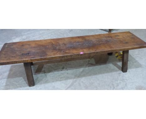 An elm pig bench. 75' long 