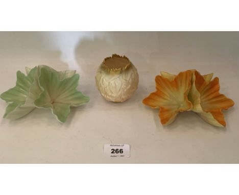 Two Grainger &amp; Co Worcester table ornaments of triple flower form, shape G480 (green example chipped); together with a Ro