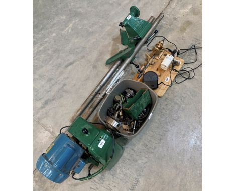 A Coronet bench lathe with a box of accessories. The lot to include a watchmaker's lathe