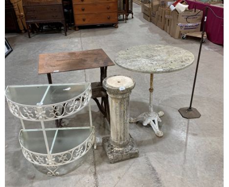 An iron based garden table; a Singer sewing machine stand; a two tier plant table; a brass stand and a concrete pedestal (5) 