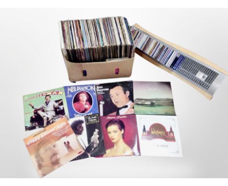 A cd rack of CD's and a further box of LP's and 45's including Rod Stewart, Elvis etc 