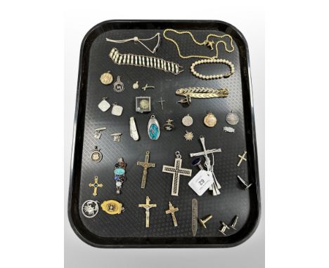 A group of costume jewellery, crucifix pendants, cufflinks etc 