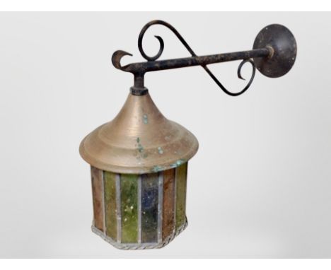 A metal and leaded glass wall lantern, length 46 cm  CONDITION REPORT: Not currently wired.