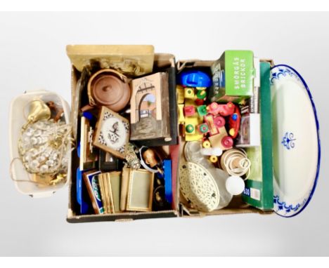 Two boxes of continental decorative wares, crystal drop light fitting, photograph frames, carved panels, metal garden trellis