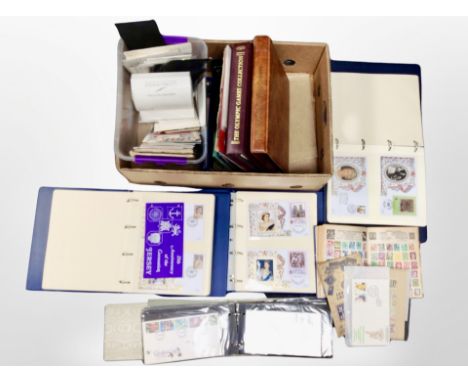 A box of several albums of first day covers, album of world stamps etc 