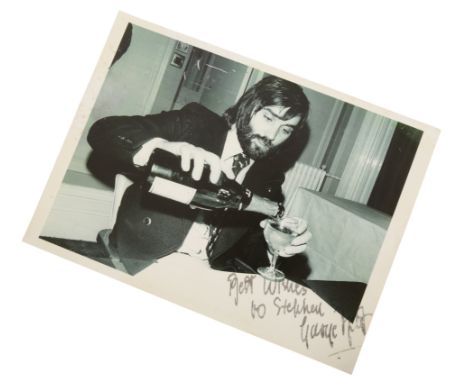 GEORGE BEST: A SIGNED PHOTOGRAPHIC PRINT 22cm x 30cm, signed in black marker 'Best Wishes / to Stephen / George Best', unfram