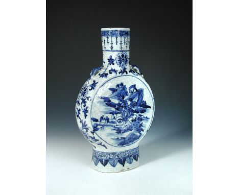 A late 19th/early 20th century blue and white moon flask, the rim of the cylindrical neck with thunder scroll band supporting