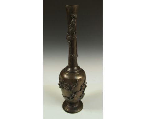 A late 19th/early 20th century bronze tall and slender vase, a dragon cast entwining the waisted cylindrical neck, three bird