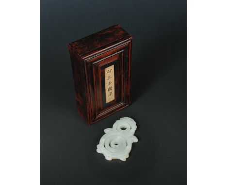A wooden boxed nephrite jade pendant, the suspension loop above an inverted double gourd outline incised with bands of leiwen