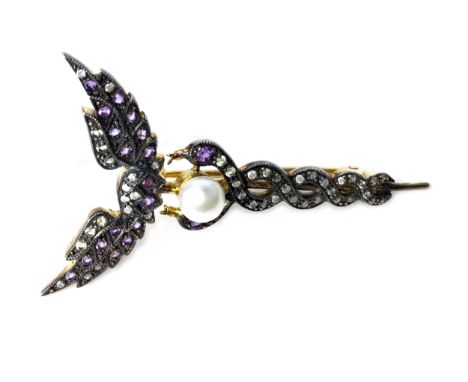 CADUCEUS STYLE AMETHYST AND DIAMOND BROOCH, set with round diamonds, amethysts and green gems, with central spherical pearl, 