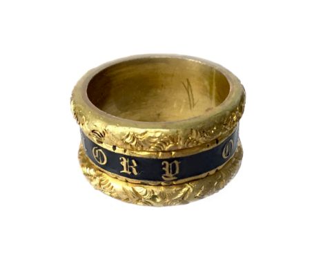 VICTORIAN GILT AND BLACK ENAMEL MOURNING RING, in the form of a broad band with central black enamel section with 'In memory 