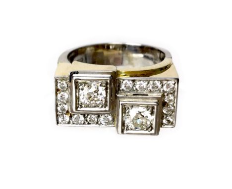 BI COLOUR DIAMOND RING, with two old cut diamonds totalling approximately 1.00 carat to square settings, bordered by round br