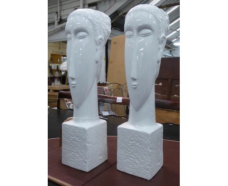 CONTEMPORARY SCHOOL BUSTS, a pair, white glazed ceramic, 61cm H. (2) 