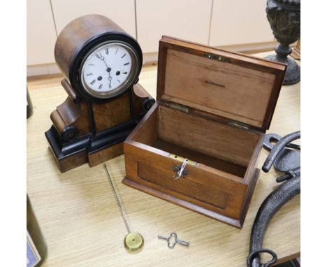 A walnut mantel clock and a late Victorian oak money box, width 24cm