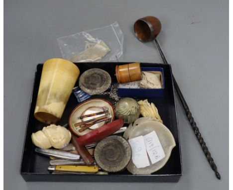 A quantity of assorted collectables including a 19th century toddy ladle, a carved ivory cane handle and an ammonite, etc.