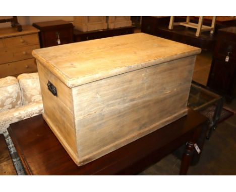 A Victorian stripped pine trunk with internal candlebox, Width 83cm