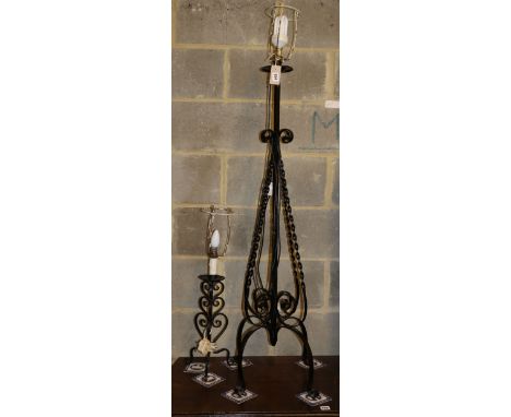 A wrought iron standard lamp, H.118cm and a table lamp