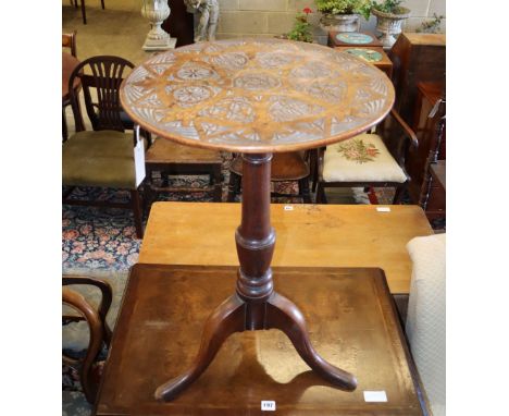 A tripod table with carved top, width 48cm, depth 48cm, height 72cm