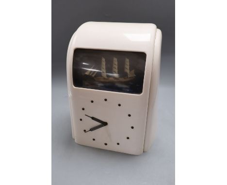 A Vitascope white bakelite 'ship' automaton electric clock, height 30cm